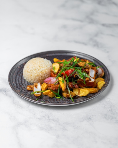 Saltado Criollo de Pescado